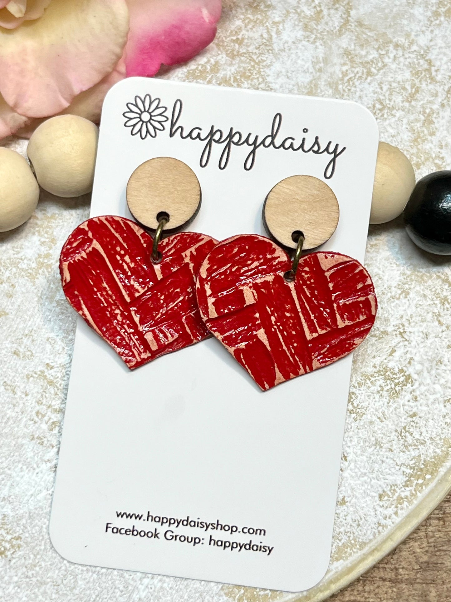 Heart-shaped earrings with wood stud connectors